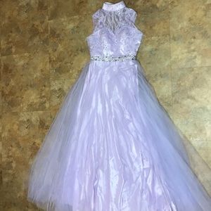 Purple prom gown with beaded waist and accents